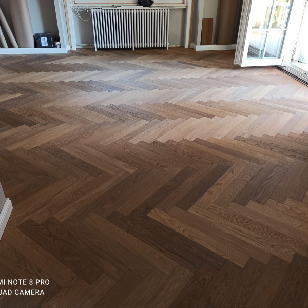 Oiled Engineered Parquet Laid in Herringbone Pattern